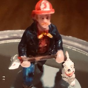 Adorable Antique small Firefighter with dog figurine
